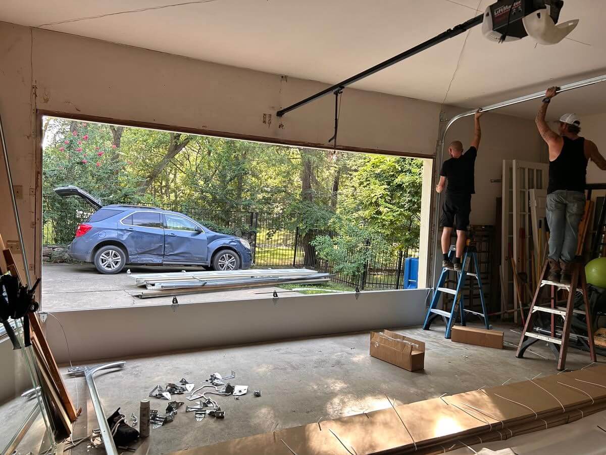 Bay Area Garage Door Pro's technician installing a garage door